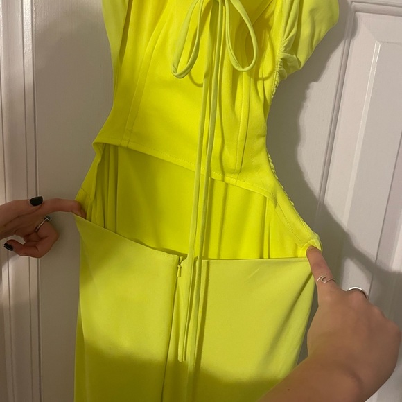 Neon yellow prom dress size 4 but altered to make smaller. - Picture 3 of 9